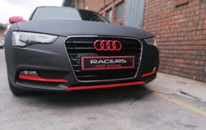 Picture shows an Audi post having had auto body repair and custom auto paint respray completed at Racers Paint and Panel