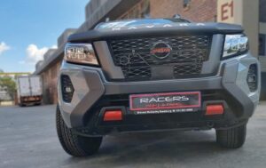 Picture shows a Nissan after having car auto body repair work at Racers Paint and Panel