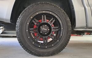 Image shows the rear wheel of a vehicle at Racers Paint and Panel after Wheel Customisation -custom respray and detailing