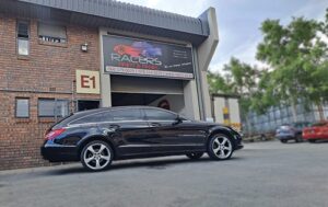 Mercedes Benz repaired by Racers Paint and panel parked outside their autobody repair shop