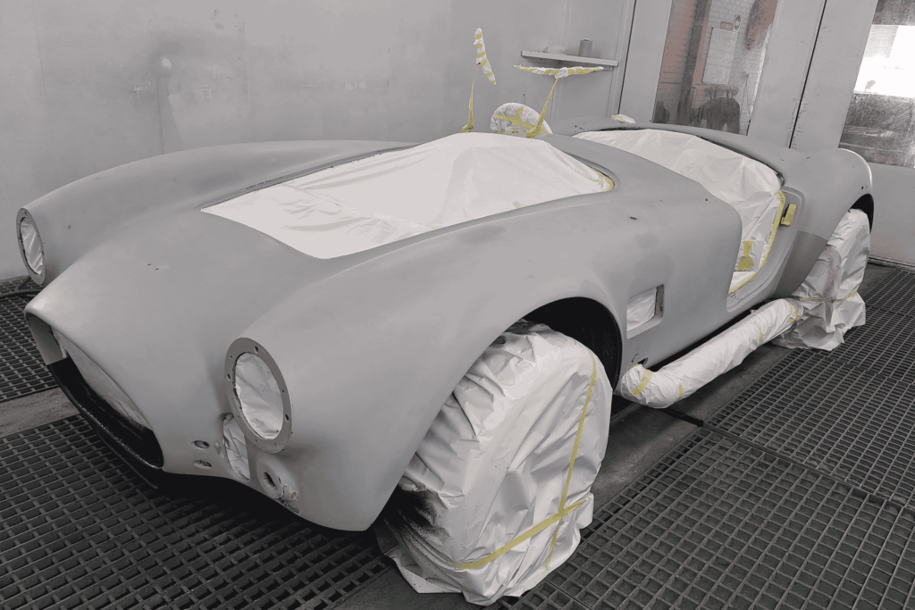 Image shows a car outside racers before respray during Car Customisation by racers paint and panel in johannesburg