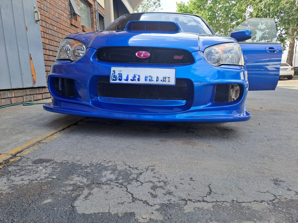 Subaru parked outside Racers paint and panel following a full car respray