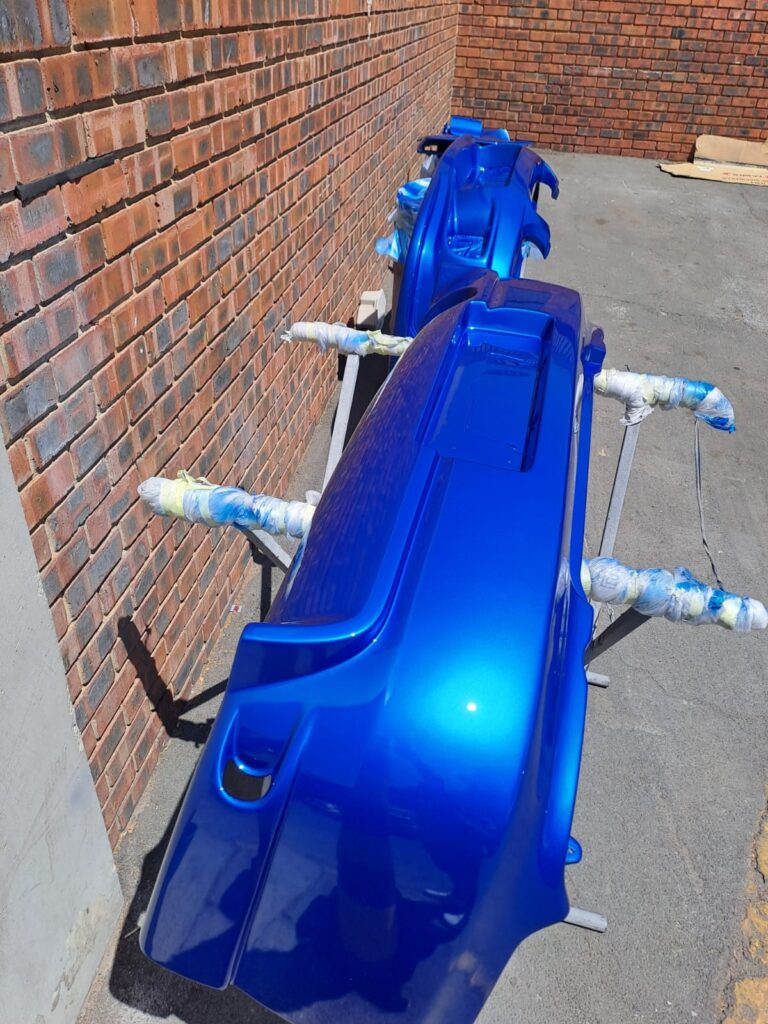image shows the bumper of a Subaru having a full respray at Racers paint and panel in johannesburg