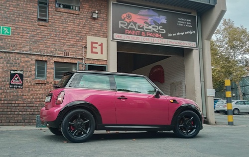 images shows a mini cooper after a full respray at racers paint and panel